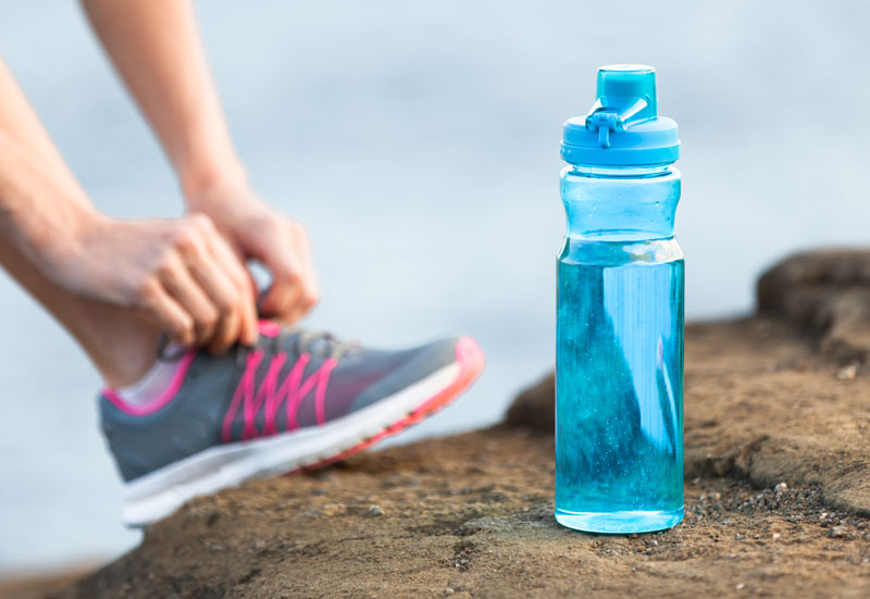 running shoe and water bottle